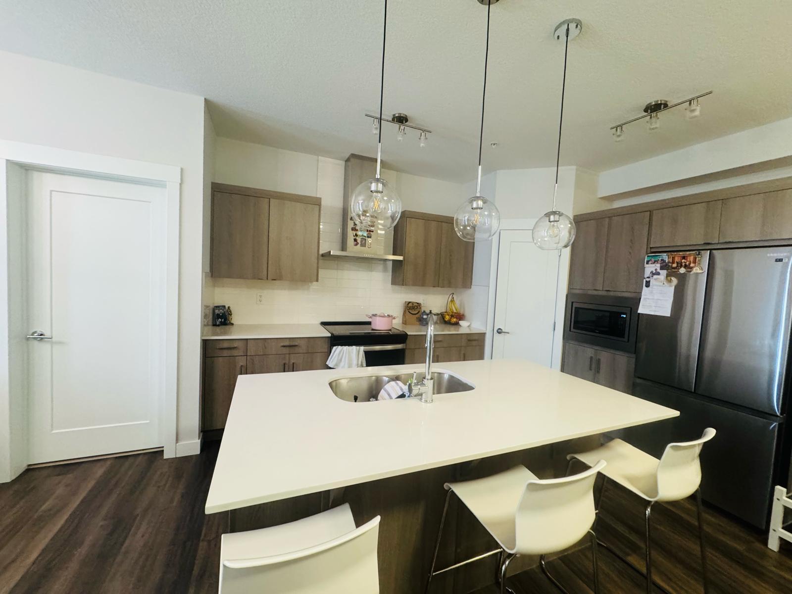 Modern 2 Bed + 2 Bath Condo – Walden (Underground Heated Parking)